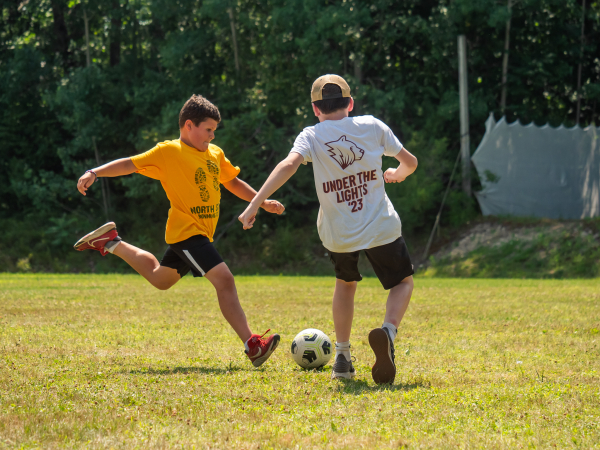 Experienced soccer coaches help campers improve their skills